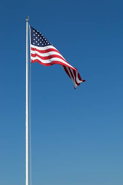 istock Large United States Flag and Blue Sky 177437343