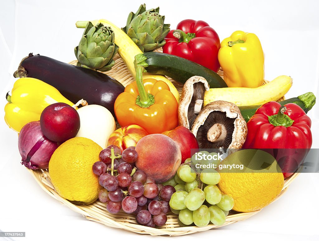 Got your Veg? "An isolated tray of various fruits and veggies including, squash, zuchini, bell pepper, grapes, eggplant, mushrooms, oranges, and peaches." Fruit Stock Photo