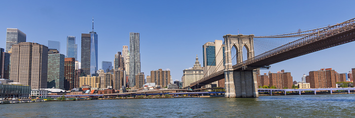 South side of the Brooklyn Bridge and the Financial District in Manhattan, New York City, USA