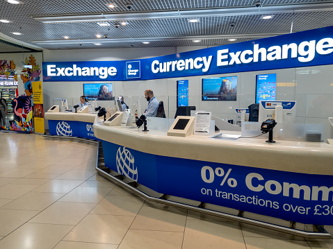Gatwick airport. UK- 10.04.2023. A large currency exchange counter in the South Terminal.