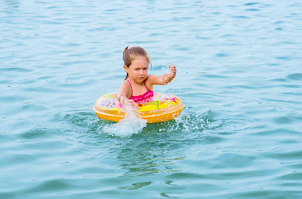 istock Girl swimming on the lake 177439904