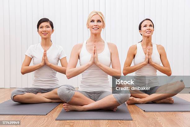 Interracial Group Of Three Beautiful Women In Yoga Position Stock Photo - Download Image Now