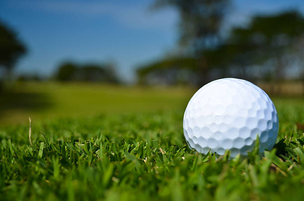 istock golf ball on green field 177440344