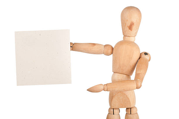istock Wooden dummy holding paper 177440664