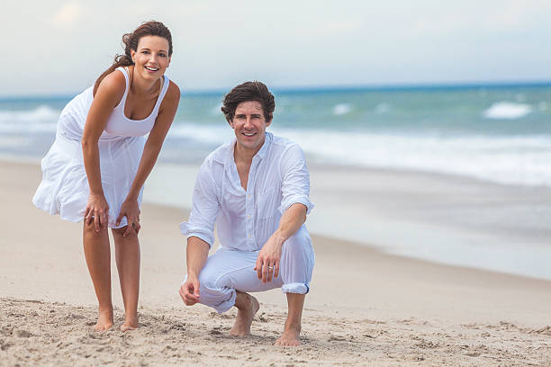 istock Man & Woman Couple Together on a Beach 177441151