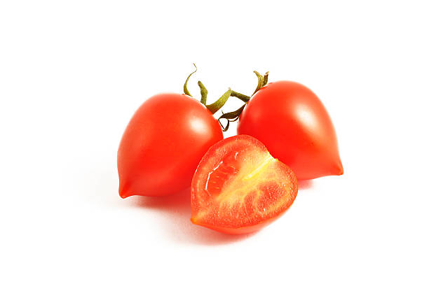 two and half cherry tomatoes stock photo