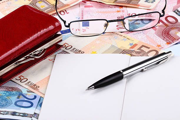 Wallet, pen and money. stock photo