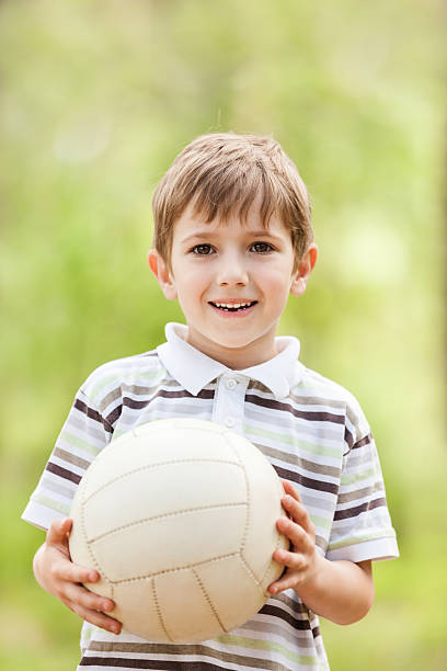 istock Child with soccer ball 177442873