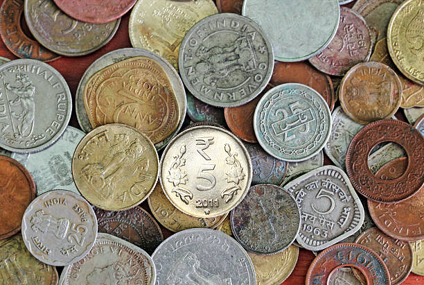 New, old and vintage indian coins background stock photo