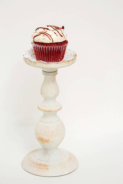 istock Red velvet cupcake on pedestal 177443688