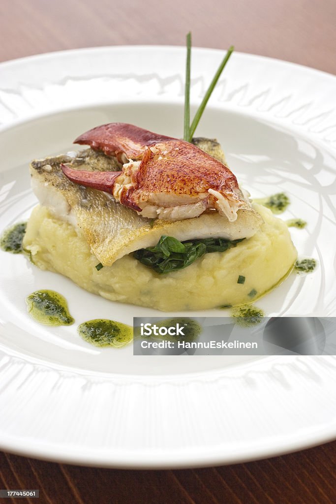 Crab Getting Smashed Crab Claw And Fish Stake On Smashed Potatoes Stock Photo - Download ...