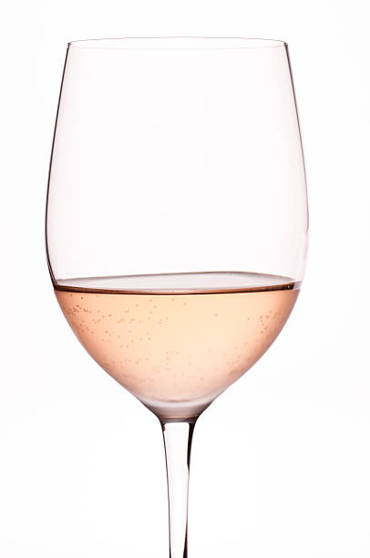 Grouping of five varieties of rose wine in wineglasses.