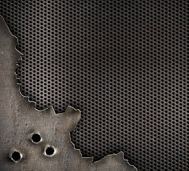 istock metal with bullet holes military background 177446321