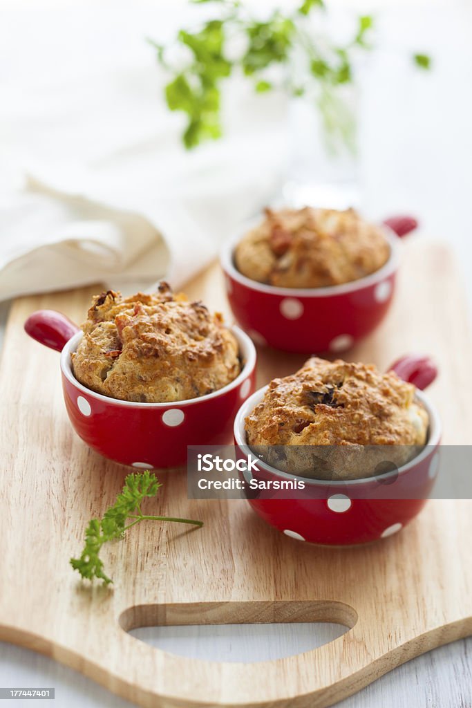 Ham, cheese and tomato muffins "Ham, cheese and sun dried  tomato muffins" Cheese Stock Photo