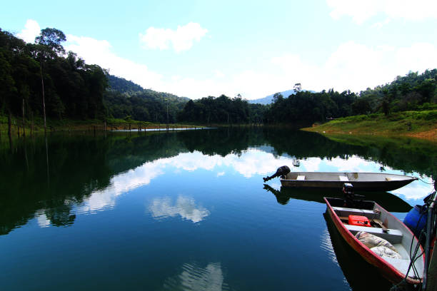 istock Reflection of lake with boats 1774476185