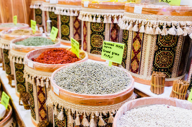 Large drum drums containers containing spices including pepper, coriander, herbs and mixes.