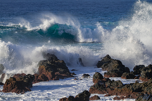 large waves hitting the volcanic rocks with force, on the north coast of Tenerife, Canary islands
