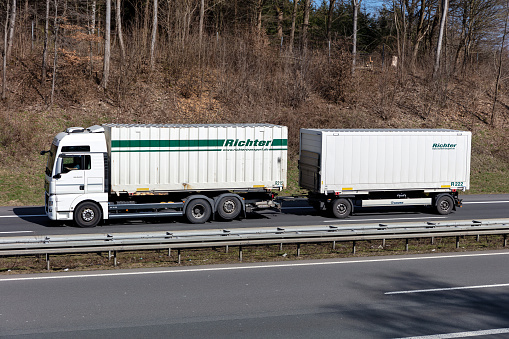 Animal feed transport truck traveling on a highway in Spain. Concept: road transport