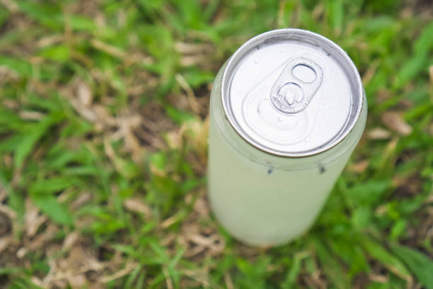 istock Cold drinks in plastic transparent cans with bokeh grass lawn background - Natural sunlight. Concept for Healthy food, summer thirsty, hot temperature, global boiling, dehidration. 1774492463