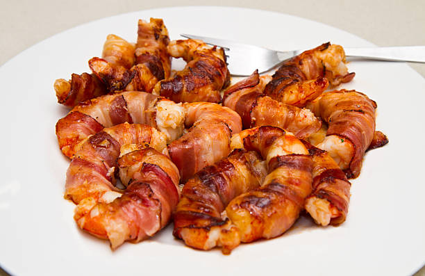 shrimp with bacon shrimp with bacon bacon wrapped stock pictures, royalty-free photos & images