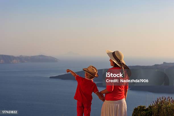 Family Looking At Santorini Greece Stock Photo - Download Image Now - Family, Santorini, Sunset
