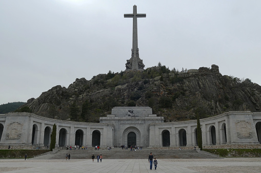 Statue The Road to Calvary carrying the cross at the Benedictine abbey Santa Maria de Montserrat. Catalonia, Spain.