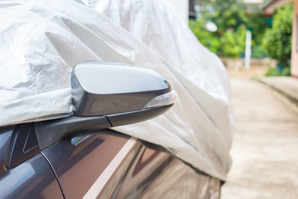 istock A car with cover sheet for sunlight protection. 1774544677