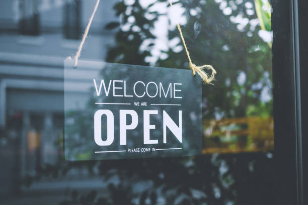 istock Text on vintage black sign Come in we're open in cafe. 1774544806
