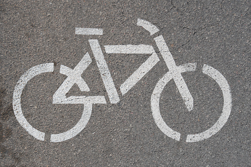 Bike path, bicycle sign on asphalt. White. High quality photo
