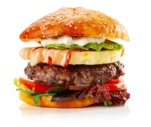 Fresh tasty burger with bacon and pineapple isolated on a white background.