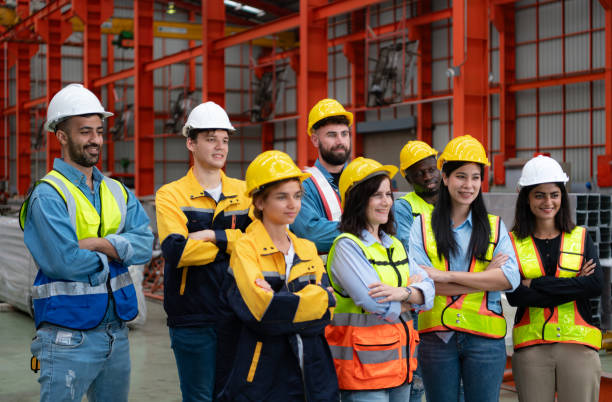istock Portrait of engineers and industrial workers in hardhats at construction site 1774553005