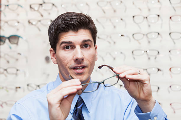 istock Man buying new eyeglasses 177455486