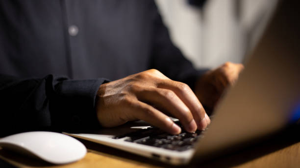istock Hands adjusting virtual firewall settings on a laptop, representing the barrier against unauthorized access. 1774579933