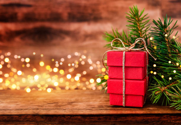 istock Christmas presents on wooden table 1774583650