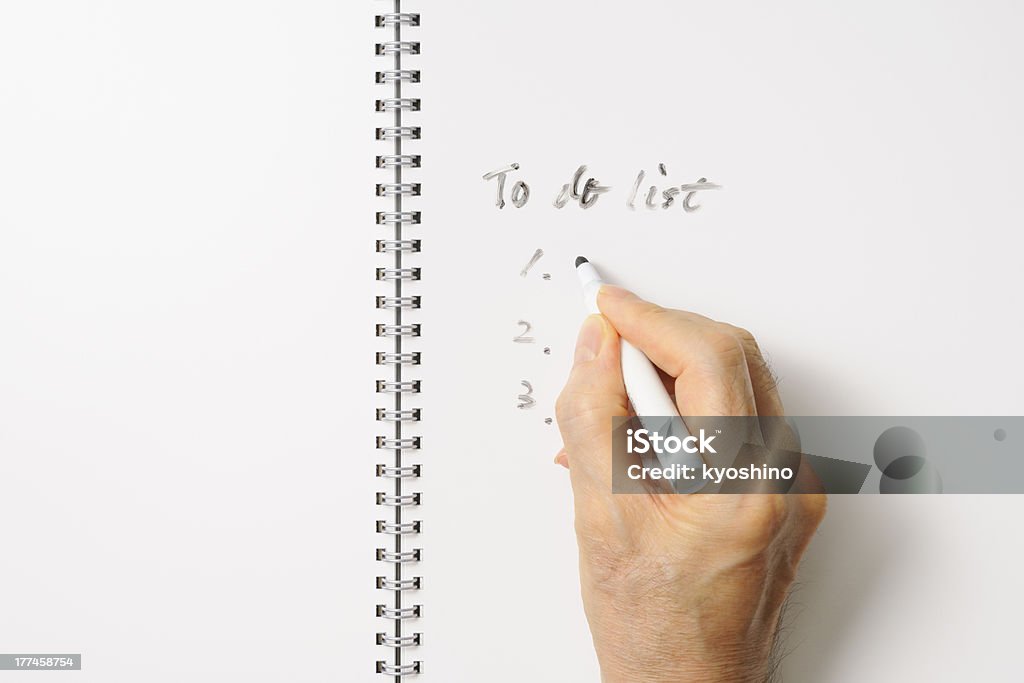 Escribiendo una lista de tareas - Foto de stock de Abierto libre de derechos