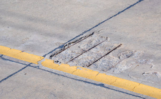 istock The old damaged concrete road with broken and crack texture on surface 1774588614