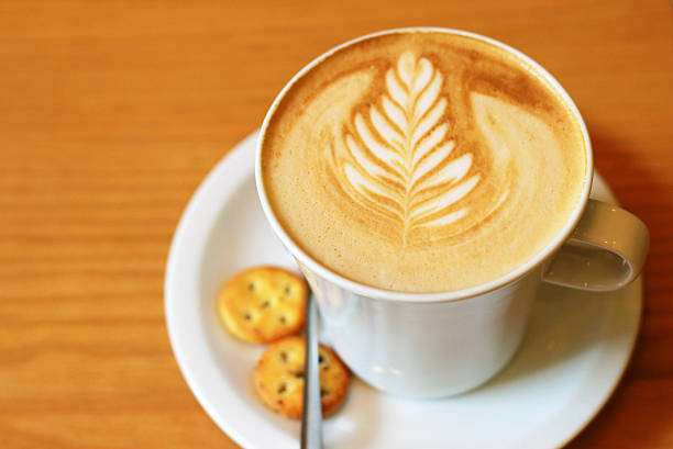istock Cup of art latte or cappuccino coffee with crackers 177459189