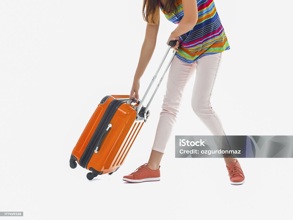 Mujer llevando una bolsa de equipaje, aislado - Foto de stock de Actividades recreativas libre de derechos