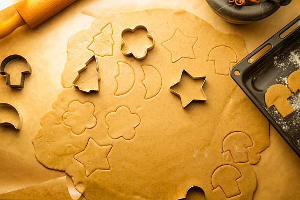 istock Cutting Christmas cookies made of gingerbread 177459827