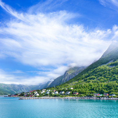 Gryllefjord is a fishing village on the island of Senja, in Troms county, Norway. Composite photo