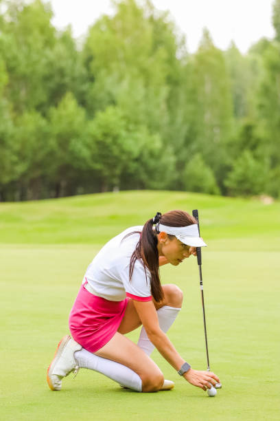 istock Beautiful female golfer successfully puts ball on field 1774643843