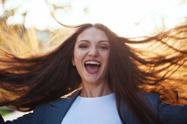 istock Young woman tossing hair 1774664470