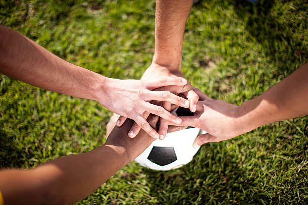Hands on Soccer Ball. stock photo