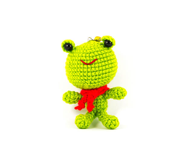 istock handmade crochet green frog doll on white background 177466788