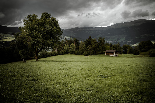 old hayloft in a pasture in Val Gardena