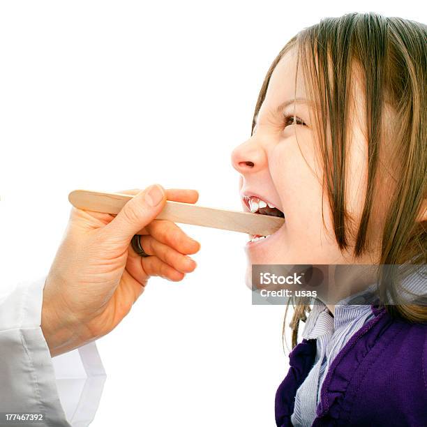 Foto de Sick Angry Menina Com Palito De Língua e mais fotos de stock de Branco - Branco, Criança, Doença