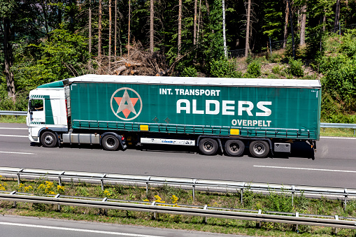 Wiehl, Germany - June 26, 2020: Alders Overpelt DAF XF truck with curtainside trailer on motorway
