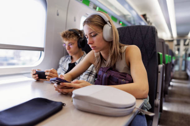 istock Teenagers travelling by modern train 1774682507