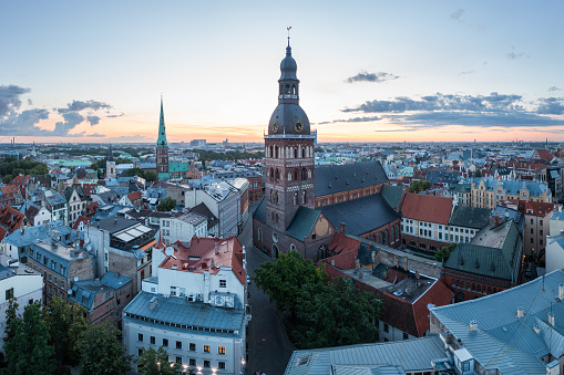 Historical buildings surrounding the historical buildings near the Dome church in Old Town Riga at sunrise
