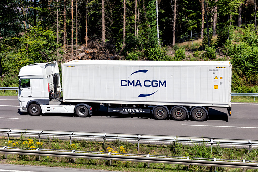Wiehl, Germany - June 26, 2020: DAF XF truck with CMA CGM container on motorway